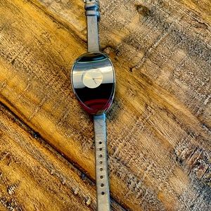 Stainless steel watch purchased in Spain. Gunmetal silver band.